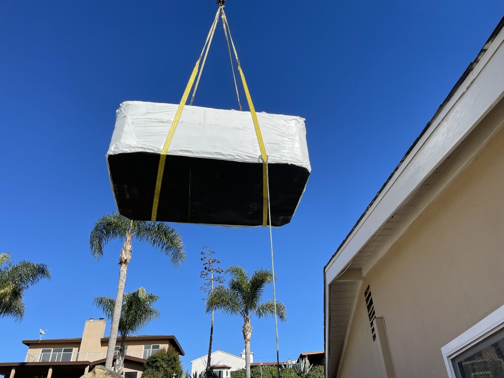 USING 90FT CRANE TO DELIVER A SWIM SPA